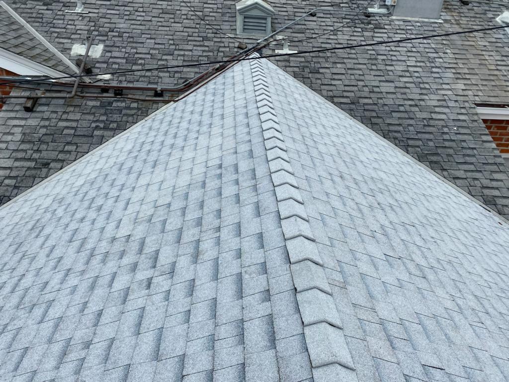 New shingle ridge on a hip roof
