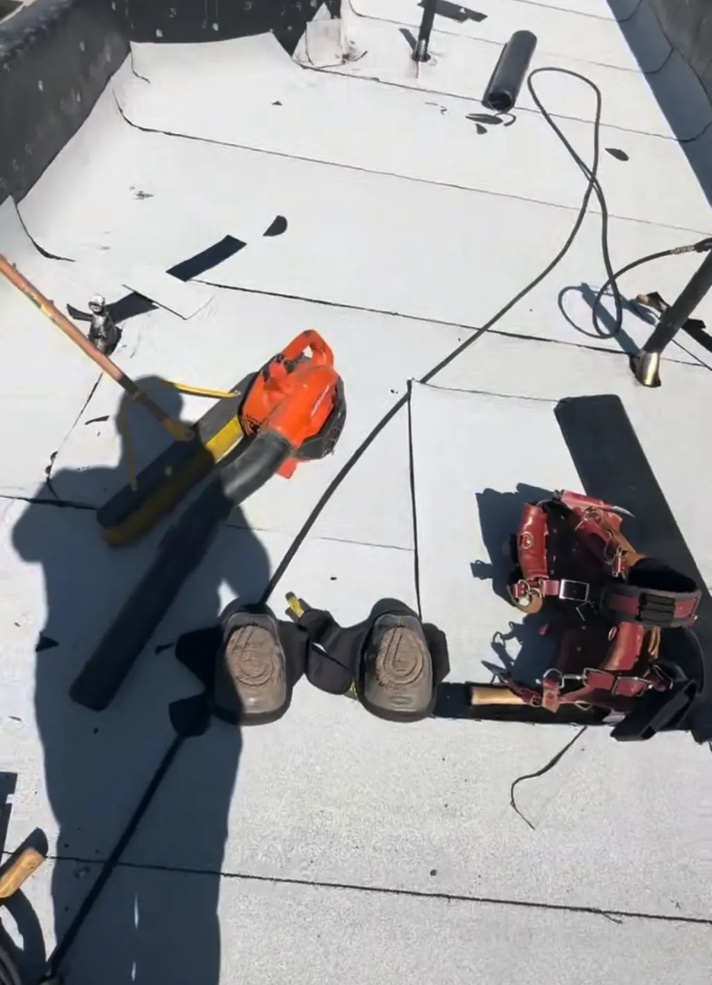 New torch-down roof with white cap sheet